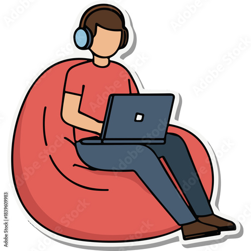 Young Person Wearing Headphones Sitting On A Large Beanbag Chair Using A Laptop Computer Indoors With Red Shirt Blue Jeans and Blue Headphones