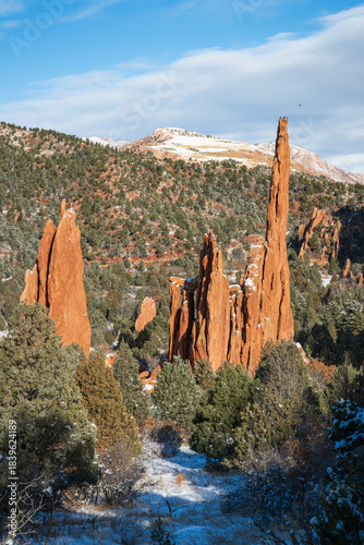 Obraz na plátně Cathedral Spires and the Three Graces red rock formations dusted with snow at Garden of the Gods Park in Colorado Springs, Colorado