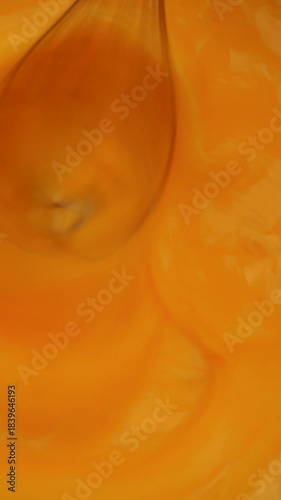 whisking yellow sauce. mixing creamy sauce with whisk. vertical video. Hollandaise, Aioli, Mayonnaise-based, Egg-based, Cheese sauce