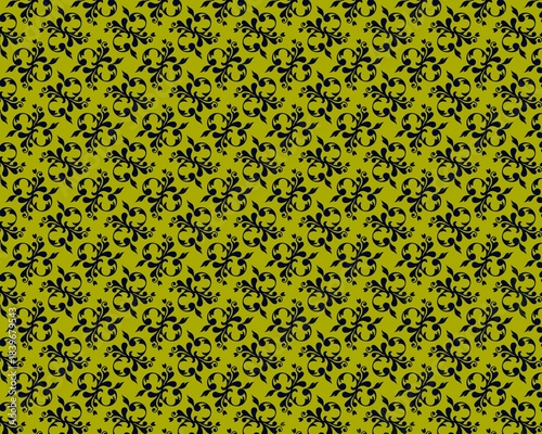 Intricate floral motifs adorn a vibrant green backdrop.  Dark elements create a detailed, repeating design.  The pattern exhibits a classic, ornamental aesthetic