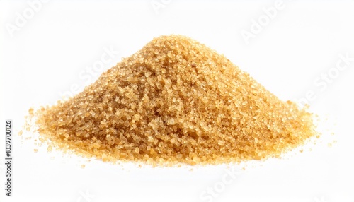 A close up photo of brown sugar piled on a white surface in soft focus photography