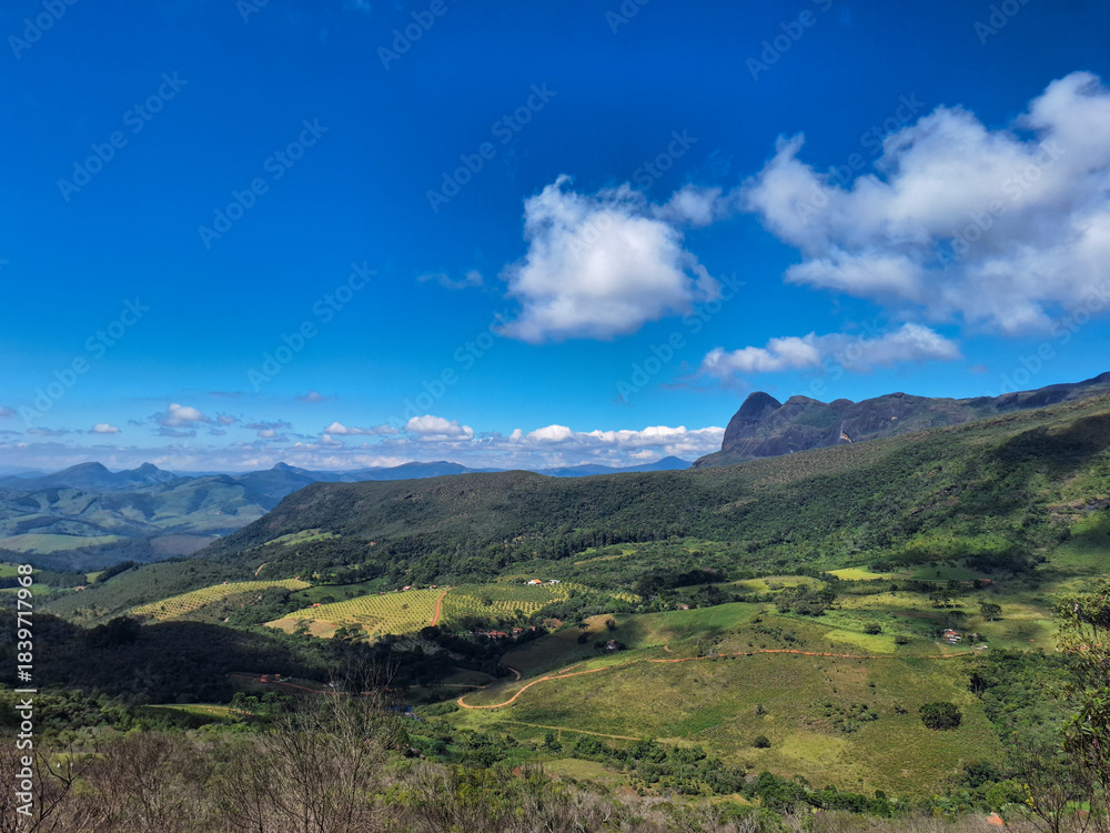 Fototapeta premium Mountain Landscape with Green Valleys and Blue Sky