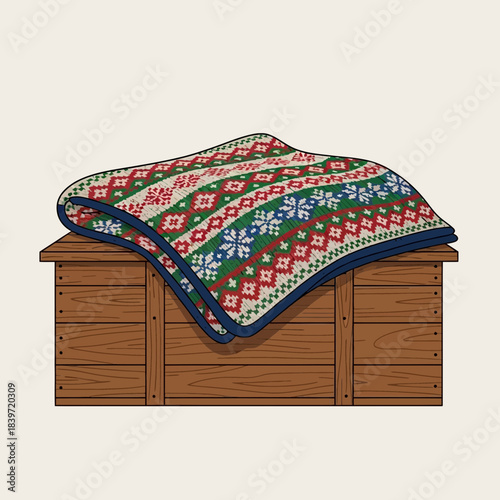 cozy wooden chest with colorful knitted blanket draped atop on plain background