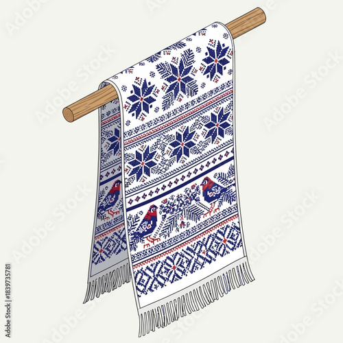 Decorative blue and white knit textile hanging on wooden rod with intricate traditional patterns