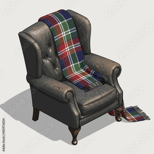 Vintage leather armchair with tartan blanket draped over the backrest and an extra piece of fabric