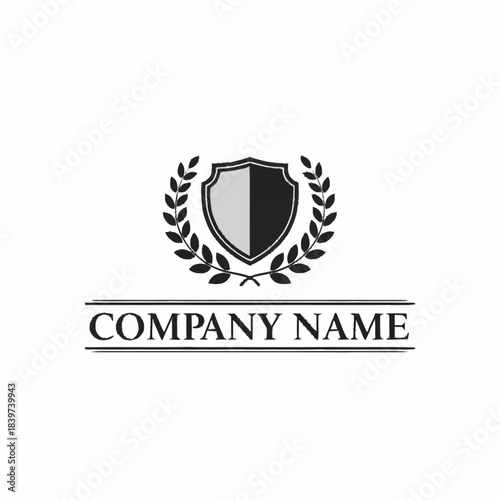 A classic black and white logo featuring a shield surrounded by laurel wreaths, with "COMPANY NAME" text below, symbolizing prestige and tradition.