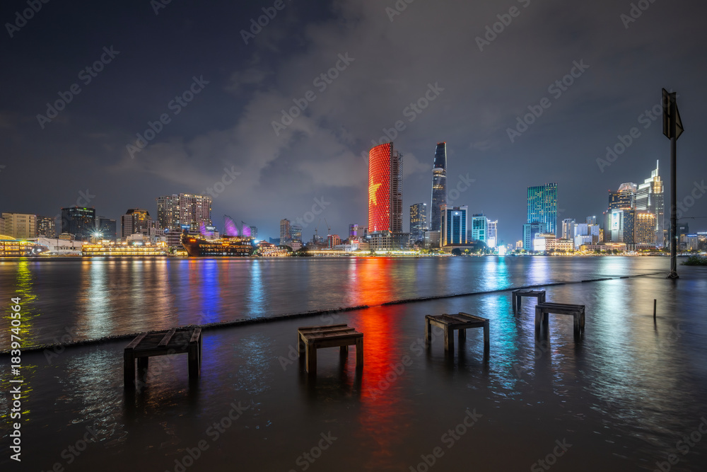 Fototapeta premium August 12, 2024: sunset in District 1, Ho Chi Minh City, Vietnam