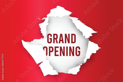 torn paper with "grand opening" written on it on a red paper background