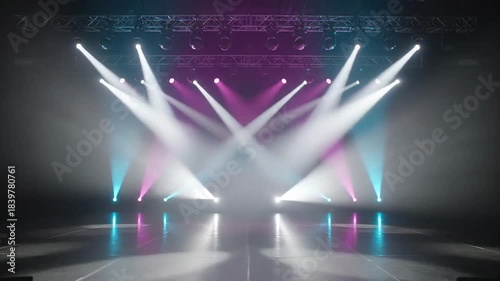 Vibrant stage with colorful spotlights, dramatic lighting creating an energetic atmosphere, ideal for concerts or theater performances
