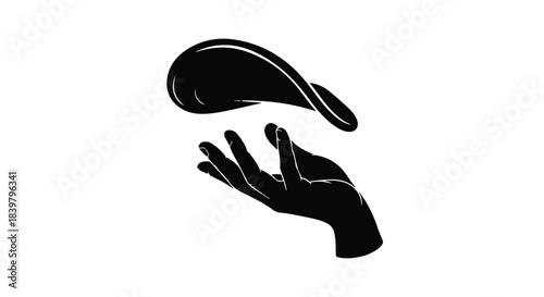 Sleek black hand catches abstract flowing shape, creating a sense of dynamic movement and design.