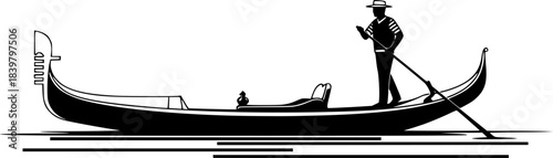 Gondolier steering gondola through water boat
