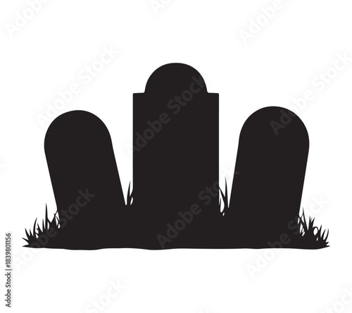  Three dark tombstone silhouettes standing in grass at a cemetery silhouette