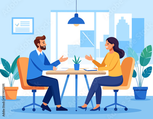 Two professionals having a lively discussion or interview at a table in a modern office setting with city views.