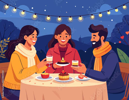 Three happy friends celebrate a birthday outdoors at night. They toast with drinks under festive string lights, sharing cake and a joyful moment together.