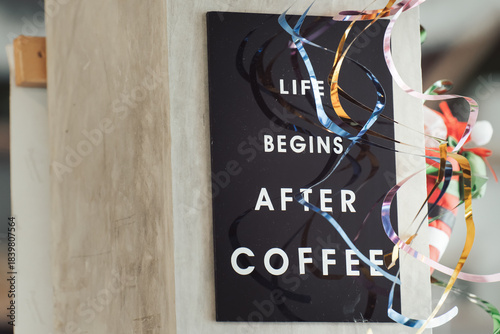 Life begins after coffee - A close-up of the slogan on a coffee shop sign - an element of the New Year's Christmas decoration of the coffee shop's interior. High quality photo.