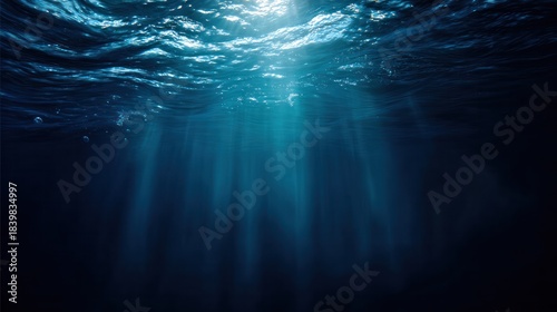 Deep sea exploration with lights piercing through dark ocean waters. mobility guides, transit brochures, designed for mobility and urban transit guides, improves user orientation.