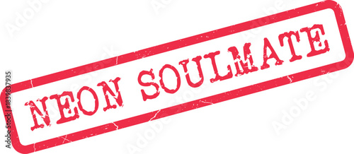 Authentic red distressed rubber stamp presents the romantic words Neon Soulmate on a clear surface