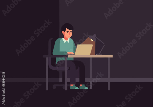 Man sitting at desk working on a laptop with a desk lamp.
