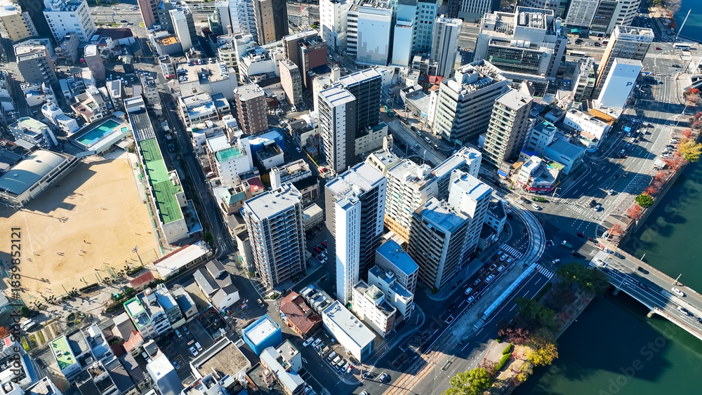 Fototapeta premium Aerial view of modern cityscape taken by drone