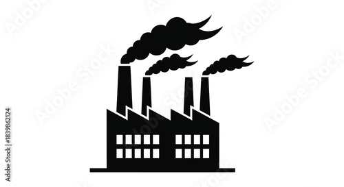 Industrial complex emitting dark smoke plumes with a stark black silhouette