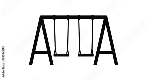 A stark black swing set stands against a white background creating a bold silhouette