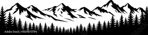 Silhouette of Pine Trees Against Jagged Mountain Peaks