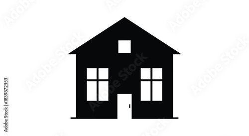 A simple black house icon with a door and windows a striking graphic silhouette
