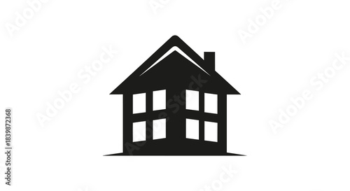 A striking black house shape with windows and a chimney a simple graphic silhouette