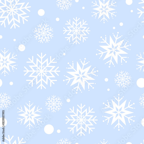 White snowflake seamless pattern with light blue background. Can be used for wallpaper, paper wrapping, fashion fabric, and winter theme decoration