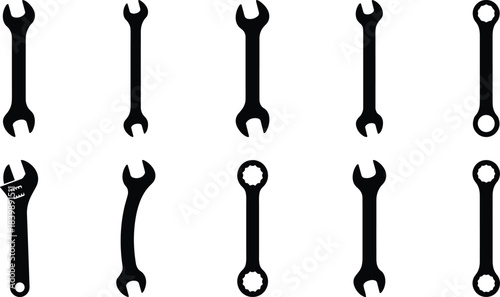 Vector illustration set of various wrench silhouettes, including adjustable, open-end, and combination tools, perfect for mechanical, industrial, repair, construction, and workshop design projects