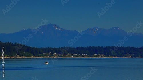  a video of a boat traveling in the Puget Sound Washington State