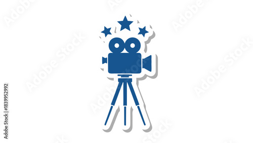 Vintage Blue Film Camera on Tripod with Stars Emblem Represents Cinema Production and Filmmaking Creativity