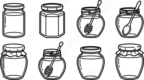 Collection of various empty glass jars with lids and spoons