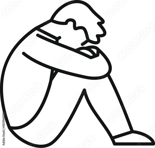 Person experiencing mental health issues, sitting curled up