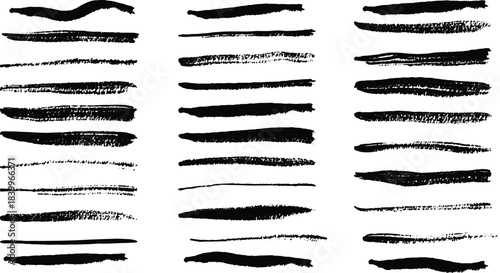 set of hand drawn ink splashes and paint brush strokes in a simple black vector design