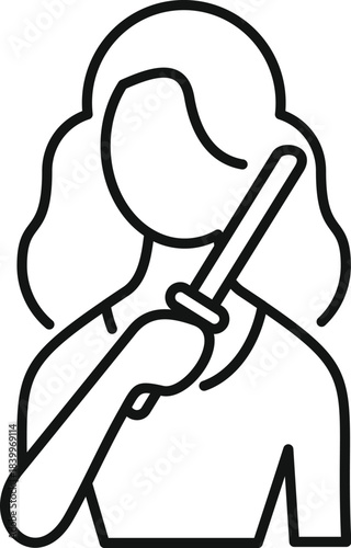 Woman holding a curling iron, styling her wavy hair, presenting a beauty and hairdressing concept