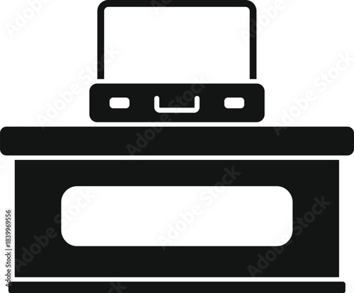 Briefcase passing through a scanning machine at a travel security checkpoint