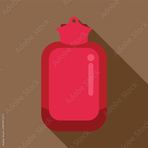 Red hot water bottle with long shadow providing warmth and comfort