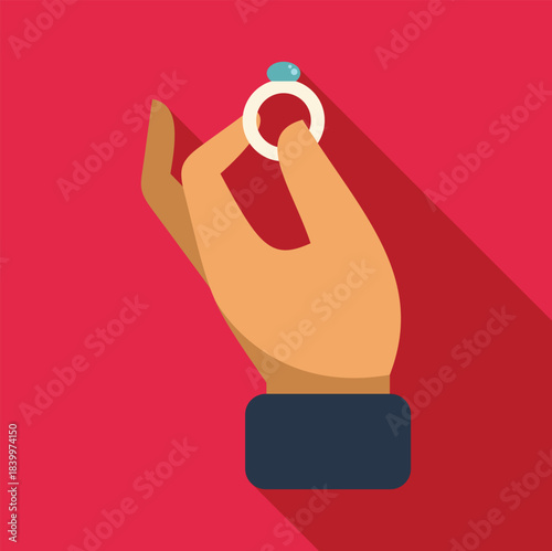 Hand holding an engagement ring representing a proposal or love concept