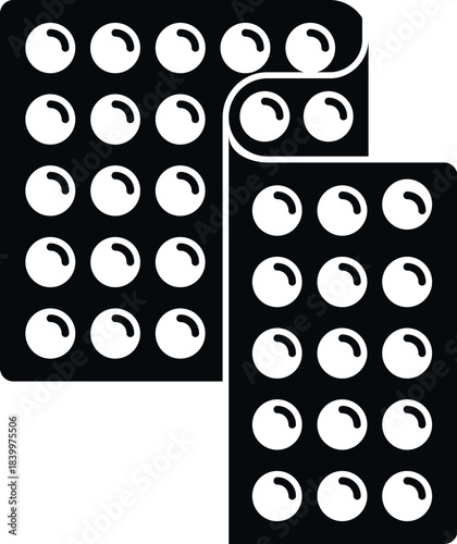 Two blister packs, one partially overlapping, containing round pills