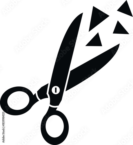 Scissors cutting paper into small triangular fragments, showing a process of disintegration
