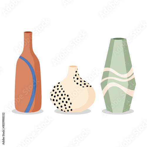 Artistic trio of modern ceramic vases - terracotta with blue waves, cream with black dots, green with white stripes.
