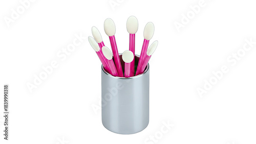 Makeup Brushes in a Silver Cup on White Background