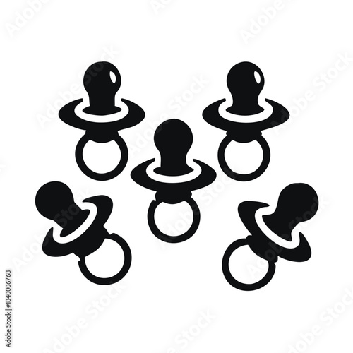 Five black silhouette baby pacifiers scattered across a clean white background for infant care