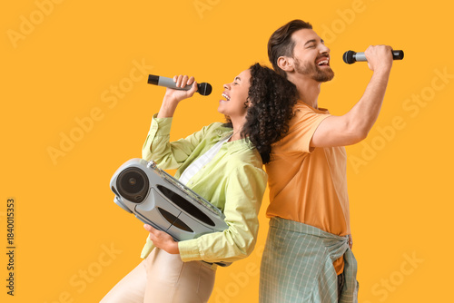 Young couple with microphon...