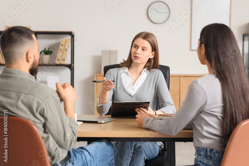 Tablou pe pânză Family mediator working with couple at table in office