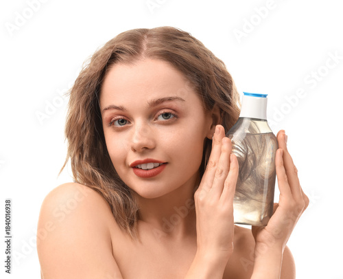 Young woman with bottle of ...