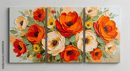 Triptych floral wall art with thick impasto red orange blossoms and soft cream flowers