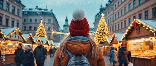 Winter Wonderland Stroll: A lone figure, bundled against the winter chill, strolls through a bustling festive Christmas market adorned with twinkling lights and charming wooden stalls.