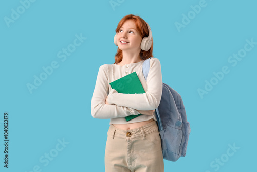 Teenage redhead girl with n...